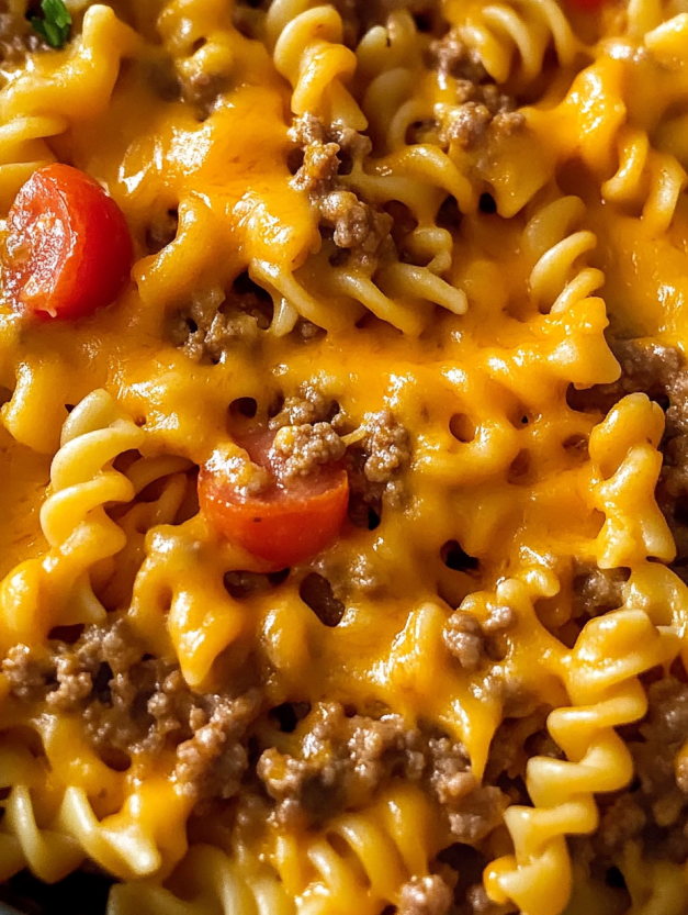 A close up of a delicious one-pot cheesy taco pasta skillet.